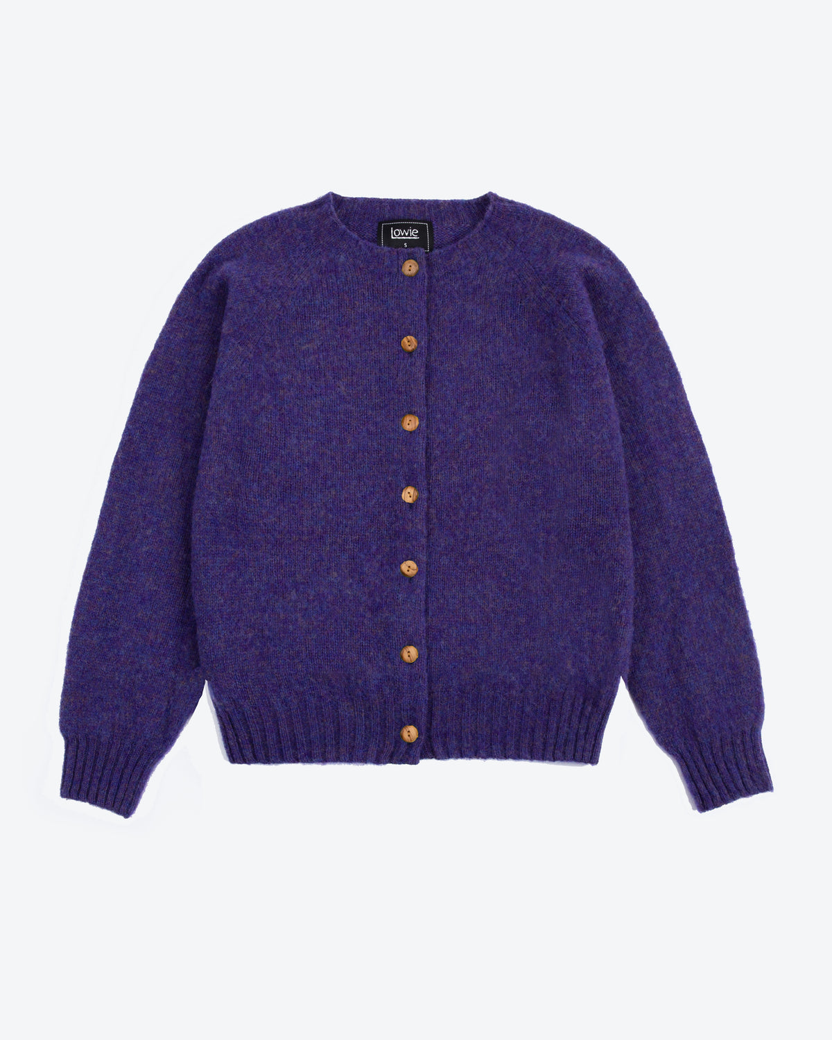 A purple knit cardigan sweater with brown buttons, laid flat against a light gray background.