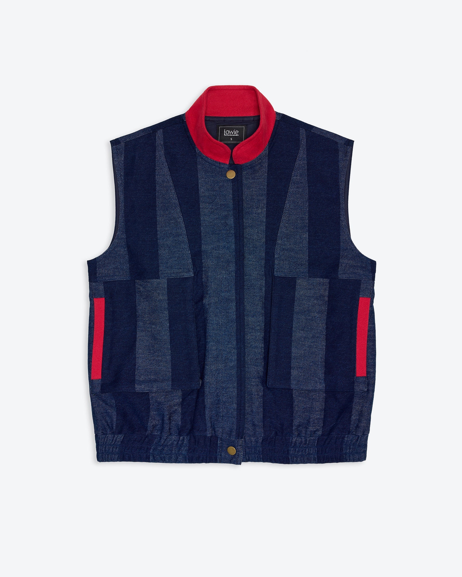 Navy denim stripe vest with red accents on a white background