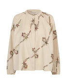 A cream-colored long-sleeve blouse with an all-over diagonal floral vine print in muted green, brown, and burgundy, shown against a plain white background.