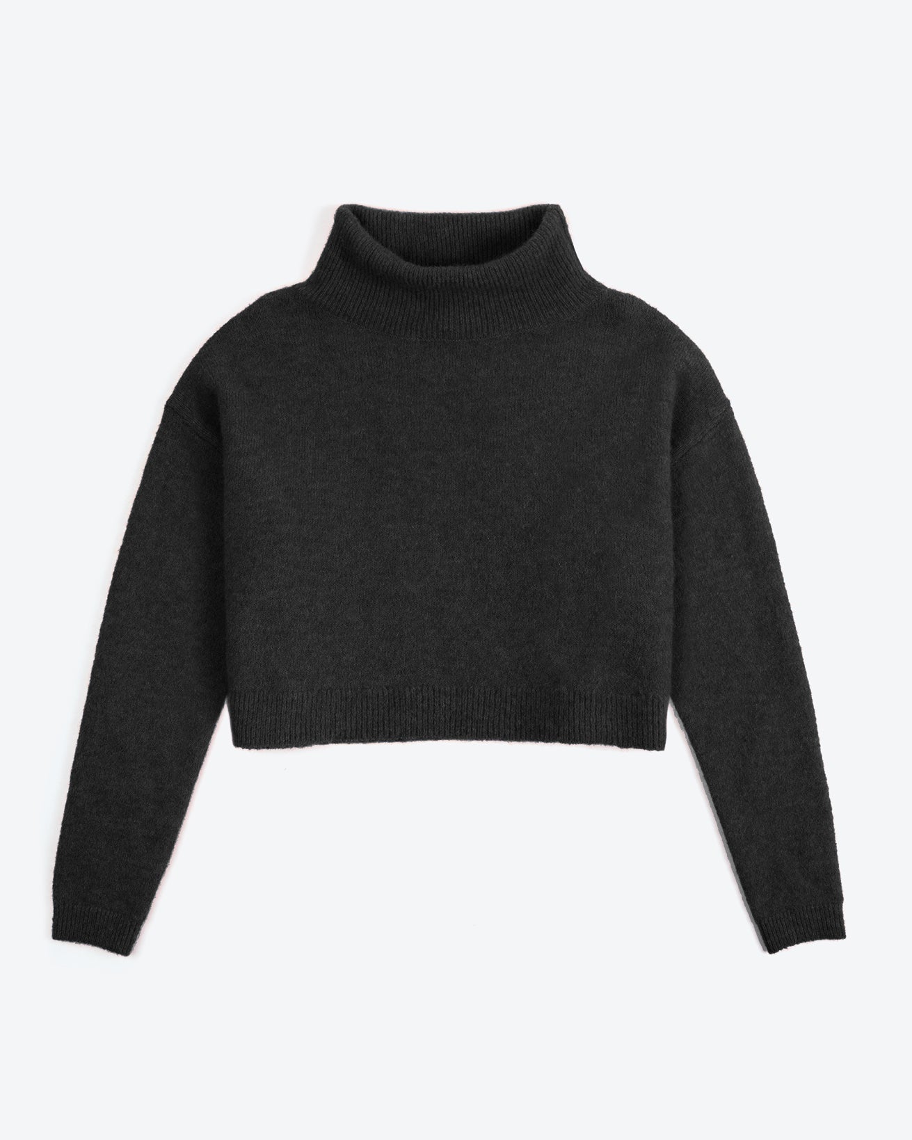 Black turtleneck sweater on a white background