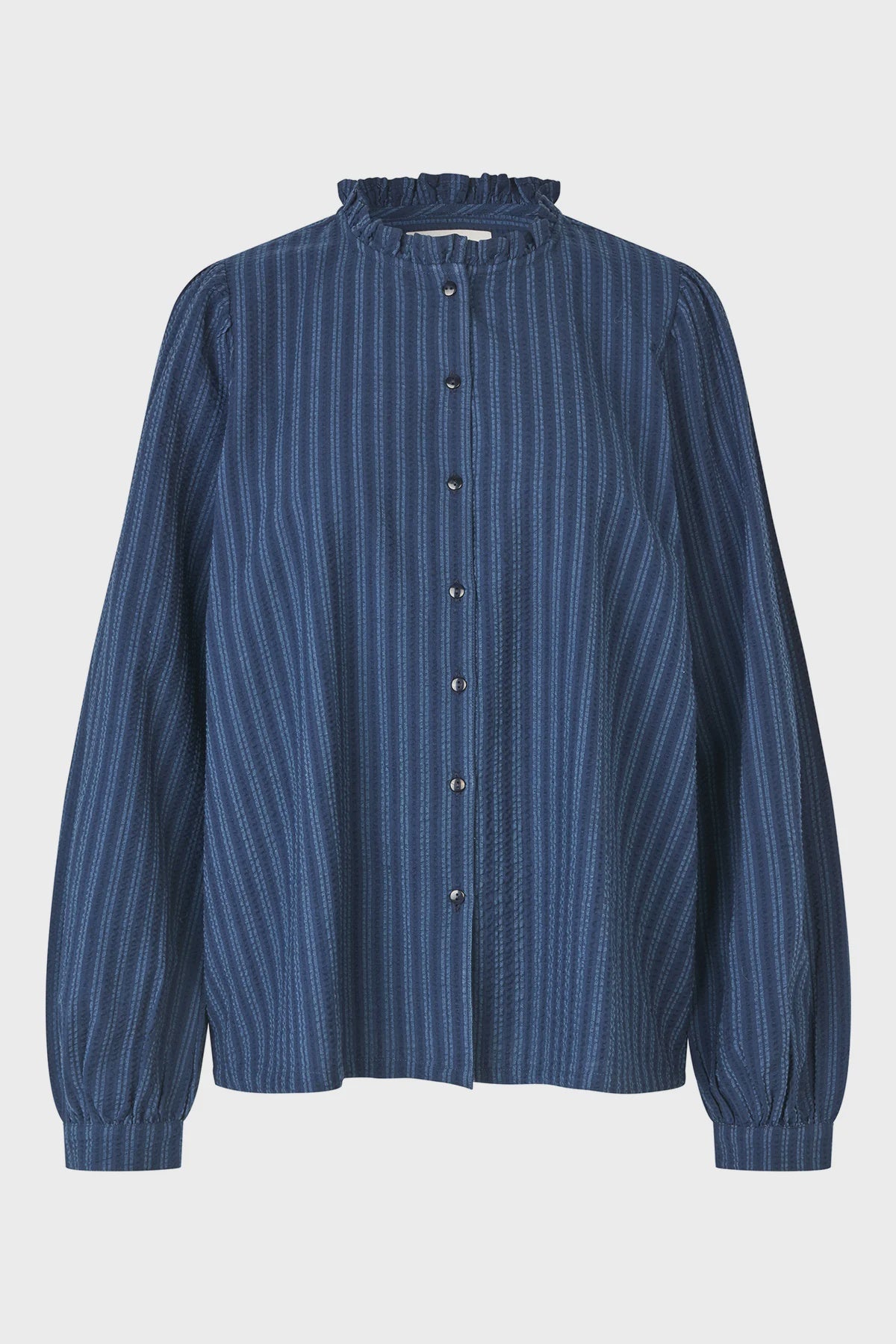 Blue striped blouse on a light gray background