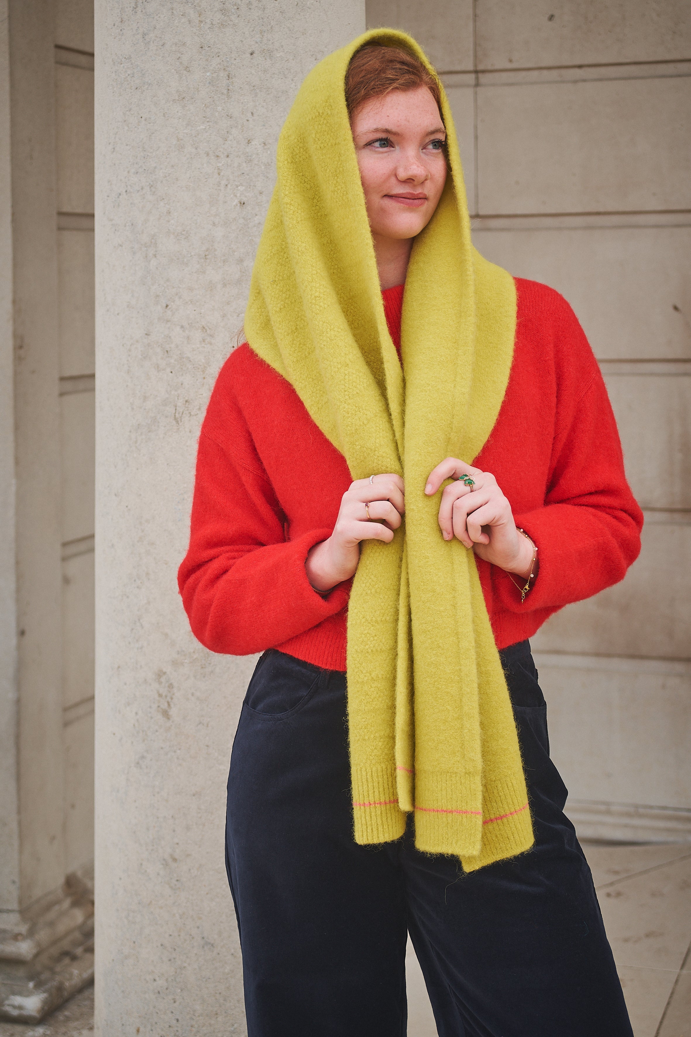 Person Wearing Yellow Scarf and red jumper 