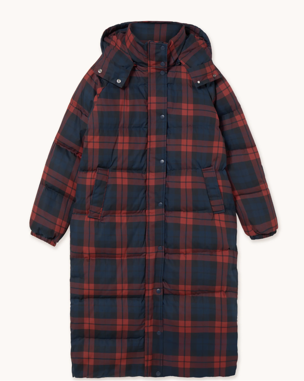 A long hooded puffer coat with a red and navy blue plaid pattern, shown flat against a light cream background.